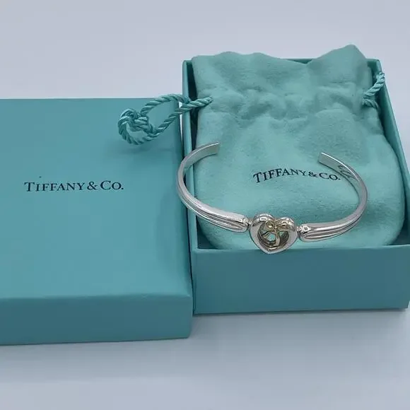 Tiffany & Co Sterling Silver and 18K Yellow Gold Heart Bow Ribbon Cuff Bracelet